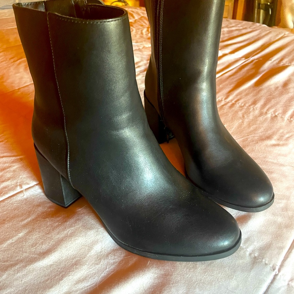 Almost New worn once.  Perfect Jeans skirt boots with easy inner zipper.